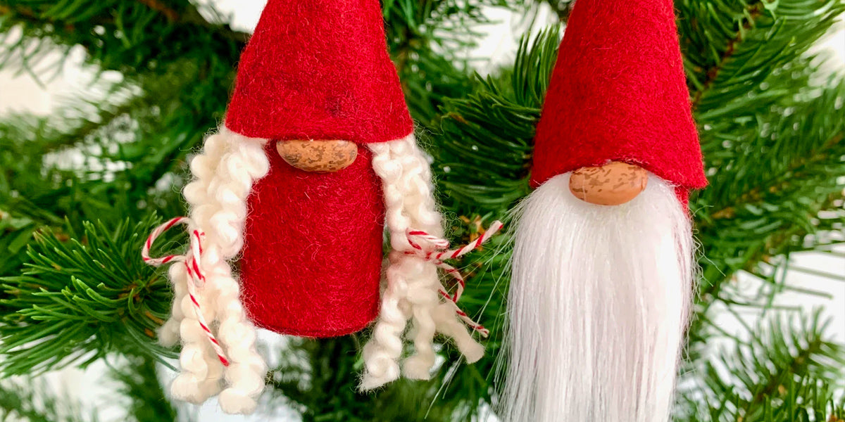 Two felt gnome ornaments in Christmas tree