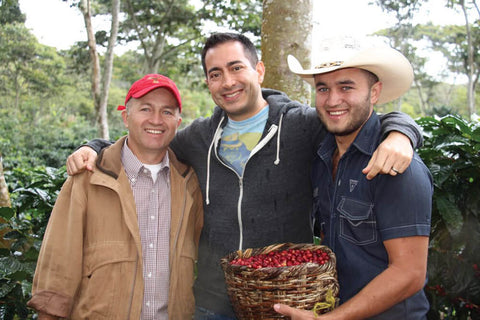 Martin Mayorga, founder of Mayorga Coffee, with coffee farm workers