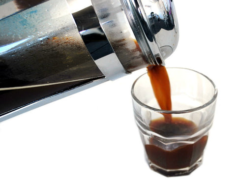 French Press Coffee Being Poured Into Glass