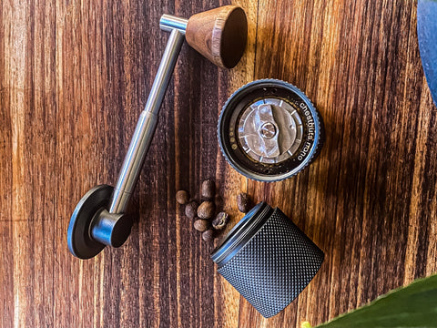 Hand coffee grinder on wooden table