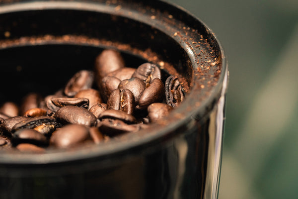 Coffee Beans In A Grinder