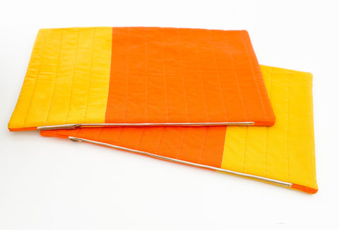 Orange and yellow quilted pillows
