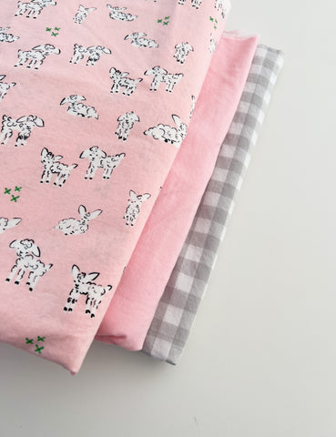 Pink fabric with lambs for baby bib set