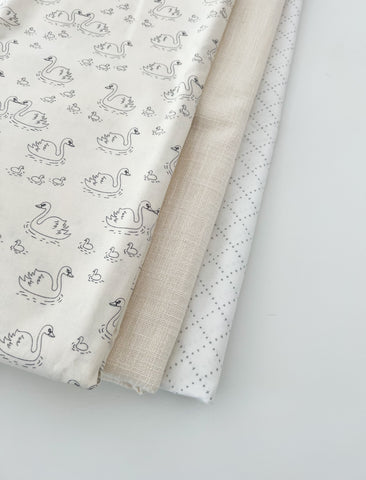 Cream swan fabric for baby bib set