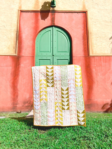 baby girl quilt in front of Alhambra water tower