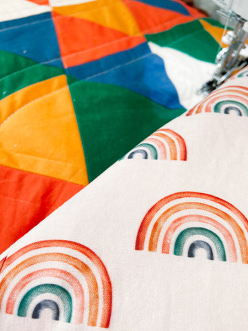 quilting the modern rainbow baby quilt