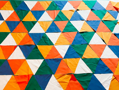 gender neutral colors in a baby equilateral triangle quilt