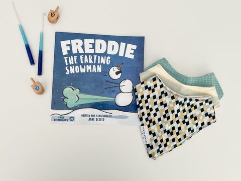 blue holiday baby bib set with children's book
