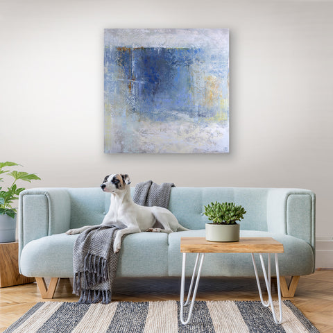 Precipice abstract painting over sofa with cute dog