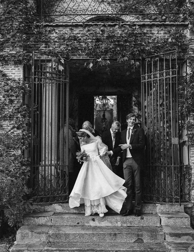 Bride leaving church at traditional wedding