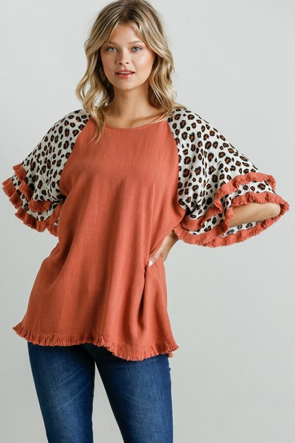 Download Umgee Red Clay Top With Animal Print Layered Sleeves June Adel