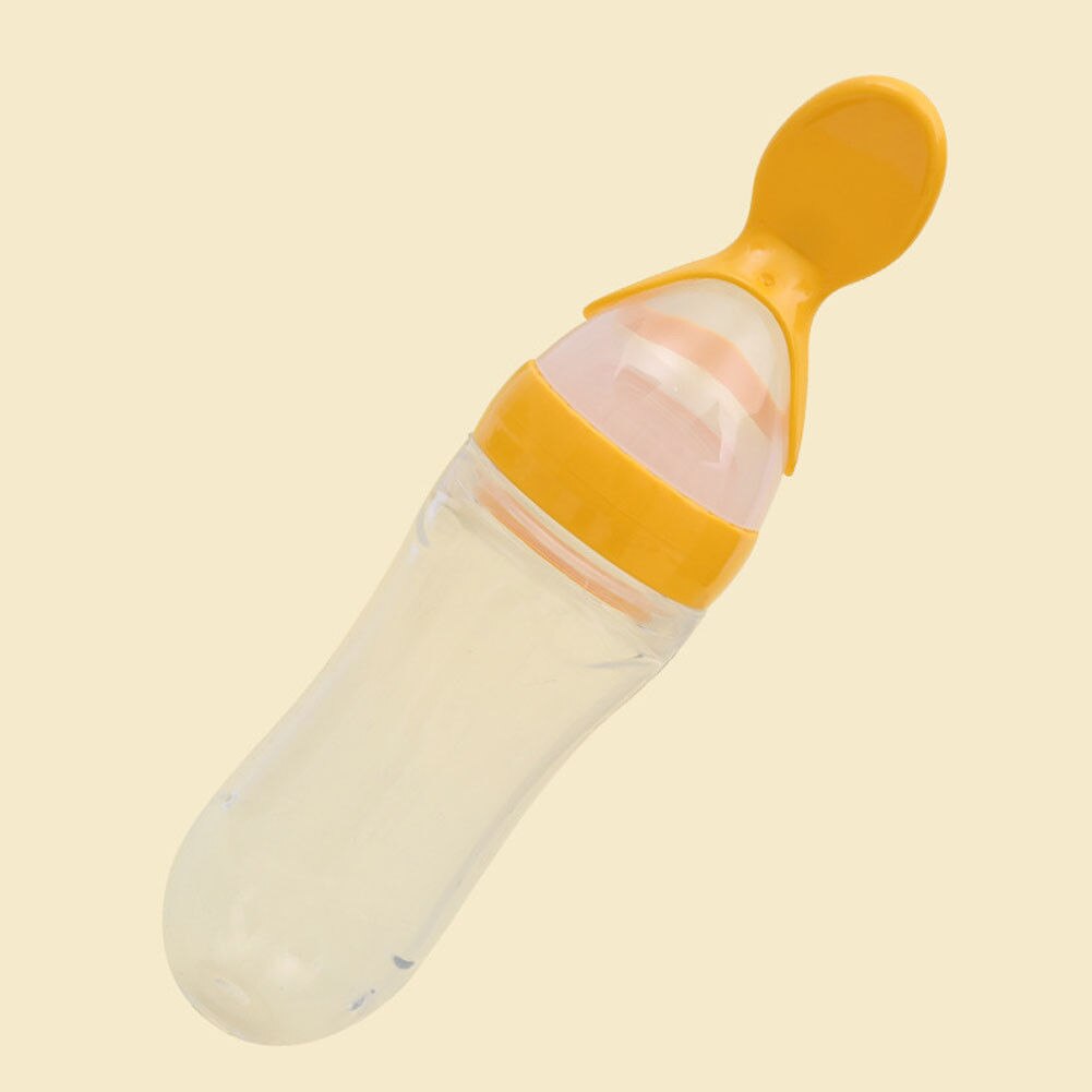 baby feeding bottles with spoon