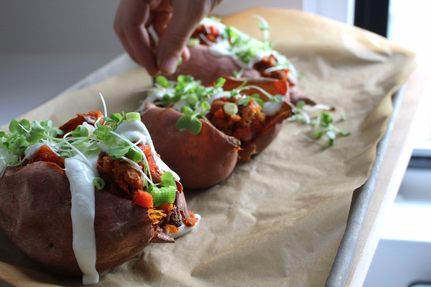 Stuffed Sweet Potato with Sour Cream, Sprouts Avocado 