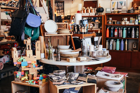 collection of homeware on table and shelves 