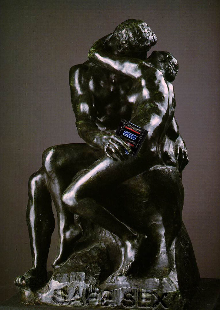 Durex logo on famous kissing sculpture