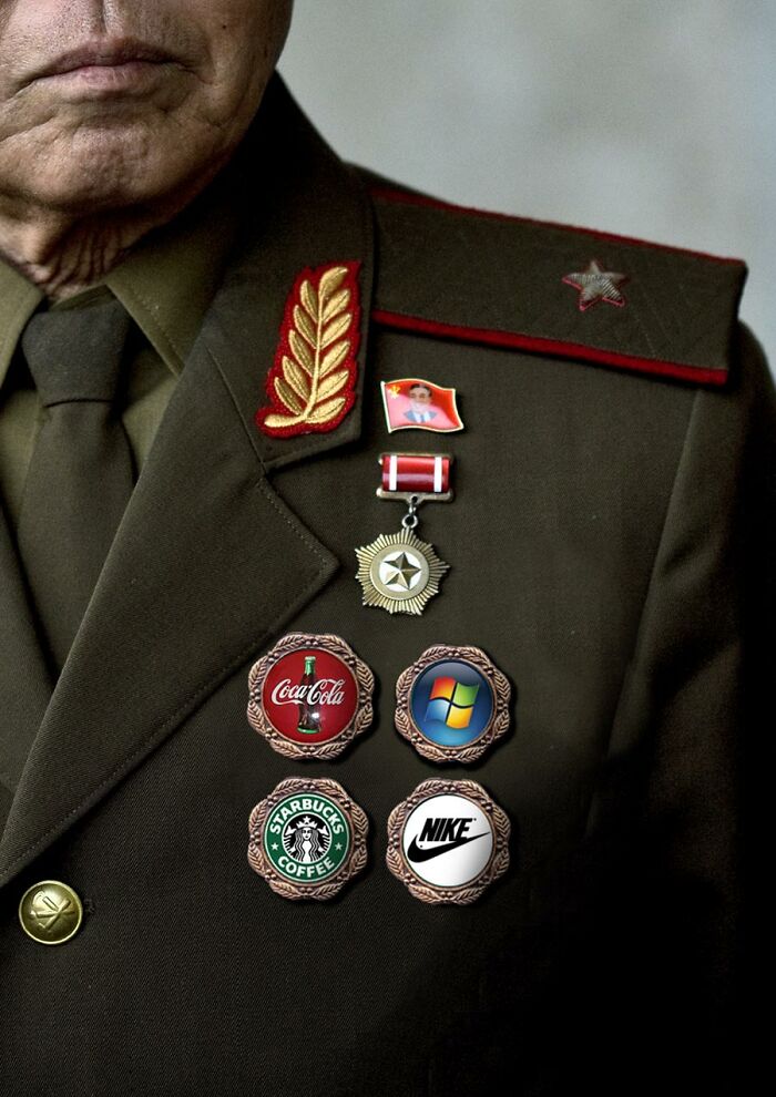 A few different logos on a soldier's uniform