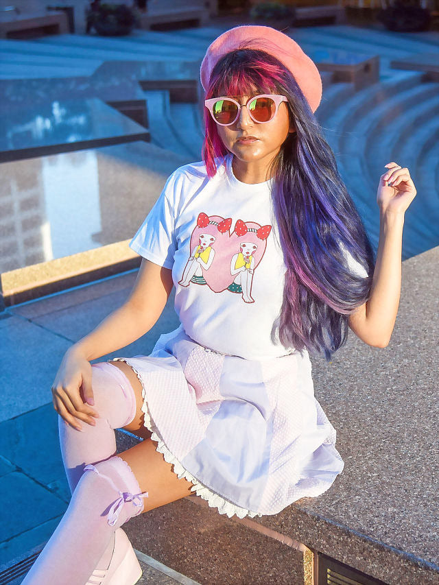 https://cdn.shopify.com/s/files/1/0280/8100/products/Local-Los-Angeles-Artist-Naoshi-Heart-Twins-White-Women_s-Tshirt-Model-2.jpg?v=1626737359&width=1080