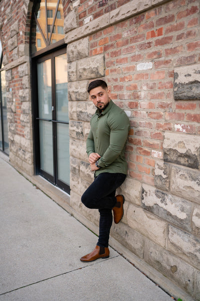 olive green shirt by Tapered Menswear worn with black jeans