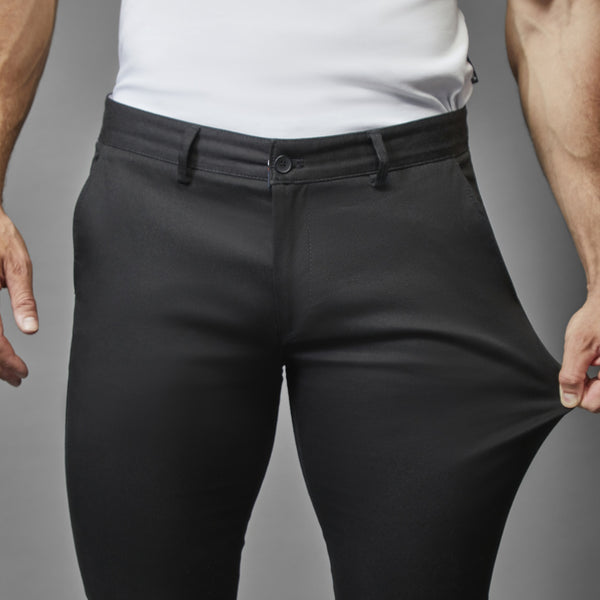 black athletic fit stretch chinos by tapered menswear showing the stretch fabric