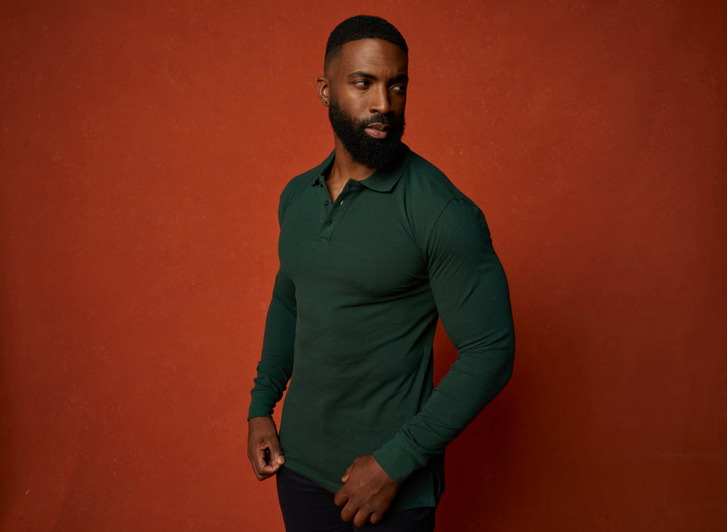 green long sleeve fitted polo shirt being work untucked at Tapered Menswear