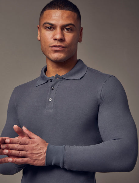 Dark grey polo shirt with long sleeves and a tapered fit by Tapered Menswear, emphasizing a muscle-fit design for a streamlined and comfortable profile.