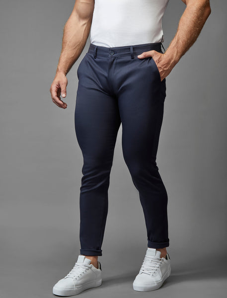 perfectly fitted navy trousers with half break by Tapered Menswear