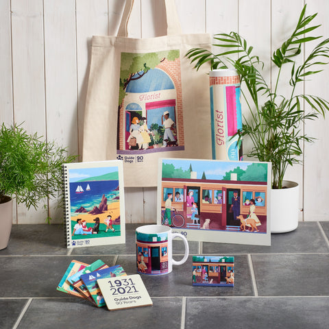 Images shows the 90 Years collection, which features tote bags, notebooks, art prints and more. 