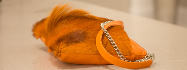 sherene melinda orange multiway leather handbag