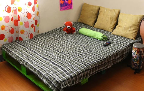 finish your pallet bed with a personal touch