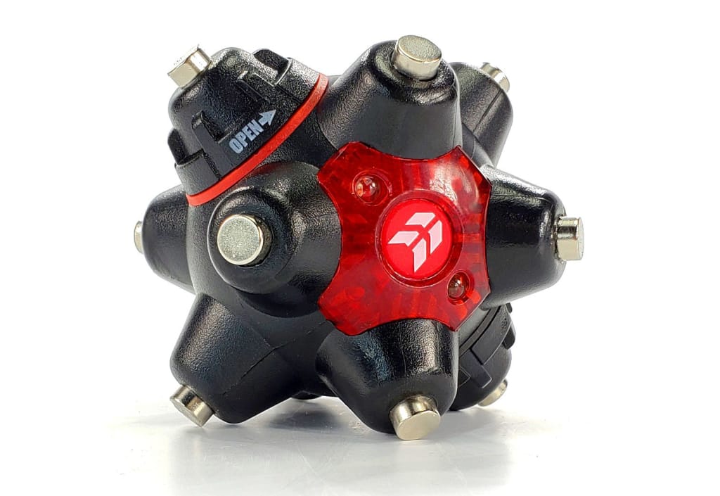 Light Mine Professional Magnetic Flashlight used as a pickup tool | STKR Concepts