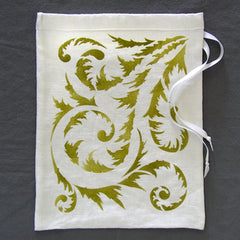 Here the Springtime Stencil from Sproule Studios is hand painted on a linen pouch.
