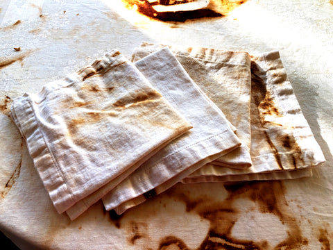 Linen napkins made from  rust dyed vintage linen tutorial by April Sproule.