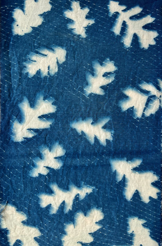 Oak leaves and net cyanotype on silk by April Sproule.