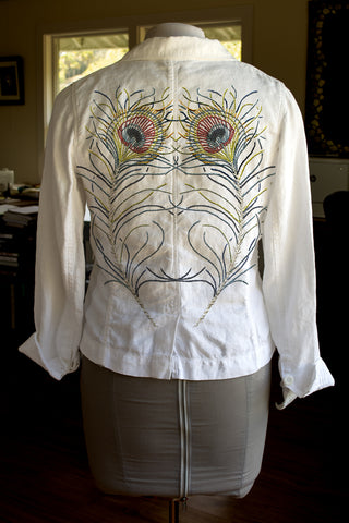 Hand embroidered linen jacket with feather pattern by April Sproule.