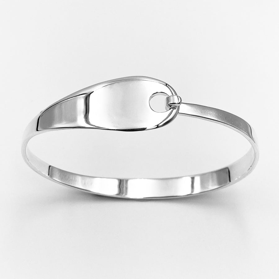 Love knot solid oval sterling silver bangle – Mist Jewellery