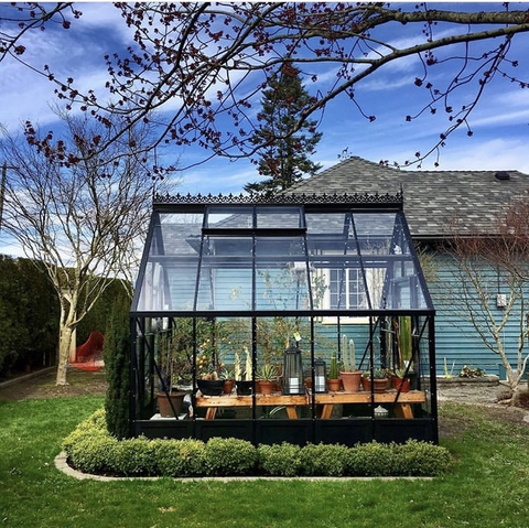 A Cross Country greenhouse in a residential garden