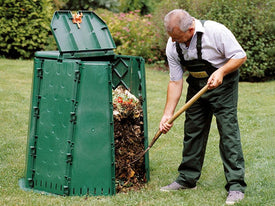 A man using AeroQuick Composter