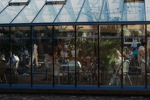 a bustling greenhouse restaurant