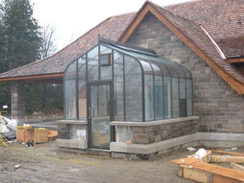 A stem, wall lean-to greenhouse