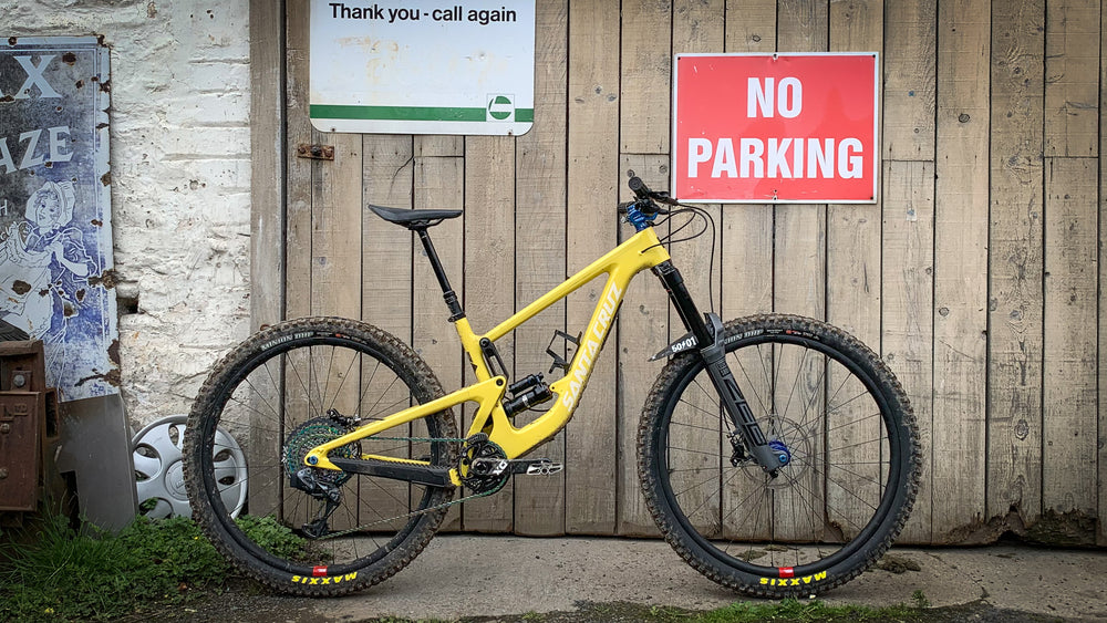 yellow santa cruz bike