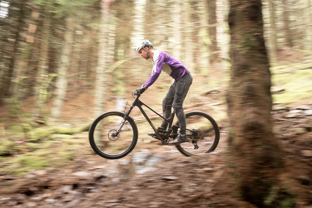 Tom riding the V2 Druid at Innerleithen DH trails