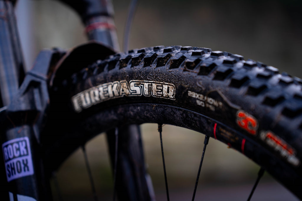 A closeup of the Maxxis Forekaster front tyre showing the agressive tread pattern.
