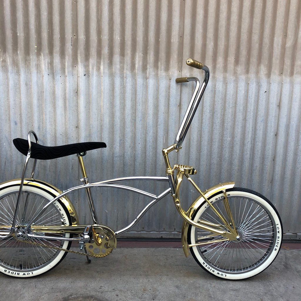 black and gold lowrider bike