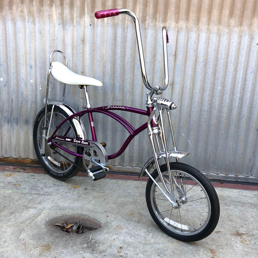 purple schwinn banana seat bike