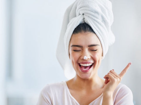 Girl Smiling With Face Cream