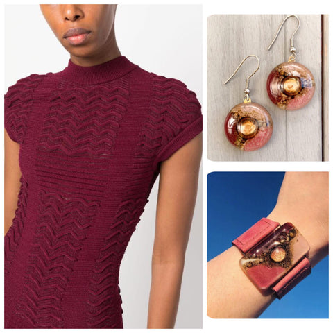 A burgundy short sleeve sweater and dark pink leather bracelet that will match the top. round drop earrings in matching red colors