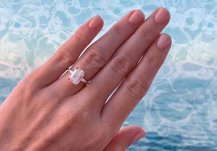 3 stone Emerald cut diamond engagement ring