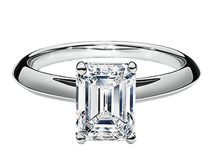 trapped Emerald cut diamond engagement ring
