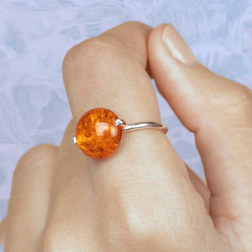Amber gemstone ring with care