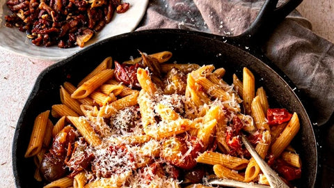 Pancetta and heirloom tomato pasta in a cast iron skillet